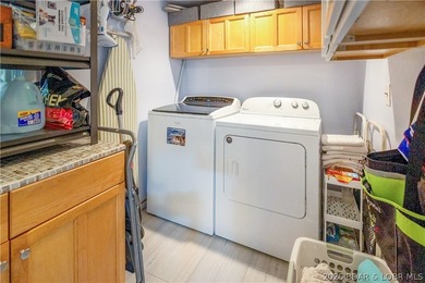 Nestled on over 2 acres with panoramic views of Lake of the - photo 46