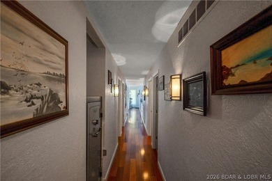 Nestled on over 2 acres with panoramic views of Lake of the - photo 49
