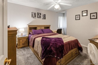 Nestled on over 2 acres with panoramic views of Lake of the - photo 50