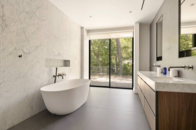 Set amidst lush greenery in one of the Hamptons' most serene - photo 13