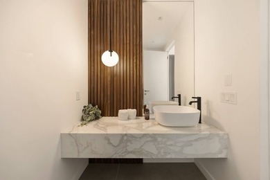 Set amidst lush greenery in one of the Hamptons' most serene - photo 24