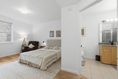 Welcome to 88 N Jackson Ave #211, a beautifully upgraded and