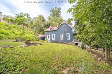 Step into timeless charm with this beautifully updated 1893 - photo 3