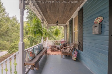 Step into timeless charm with this beautifully updated 1893 - photo 6