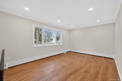 Beautifully renovated 4-bedroom Hi-Ranch offering exceptional - photo 4