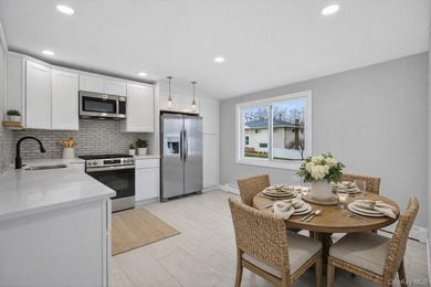 Beautifully renovated 4-bedroom Hi-Ranch offering exceptional - photo 9