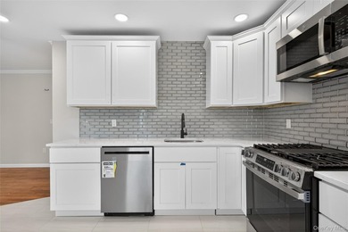 Beautifully renovated 4-bedroom Hi-Ranch offering exceptional - photo 10