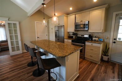 Beautifully maintained expanded ranch situated on nearly an acre - photo 5