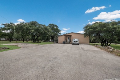 This spacious one-story home offers 4 bedrooms and 3 full