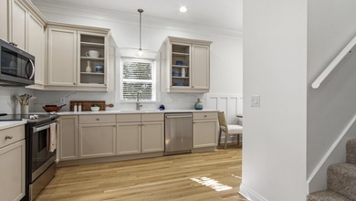 Savor the sublime seaside lifestyle in this beautifully upgraded - photo 8