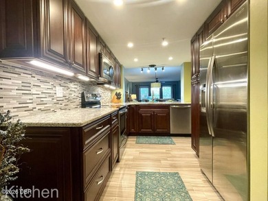 Experience coastal living in this golf & beach community. The - photo 11