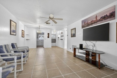 Welcome home to this inviting residence featuring tile floors & - photo 13