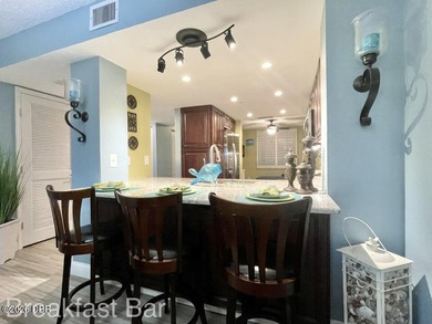 Experience coastal living in this golf & beach community. The - photo 14