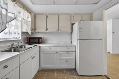 Welcome home to this inviting residence featuring tile floors & - photo 16