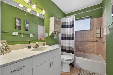Welcome home to this inviting residence featuring tile floors & - photo 22