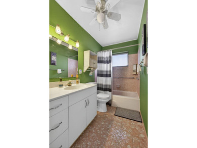 Welcome home to this inviting residence featuring tile floors & - photo 23