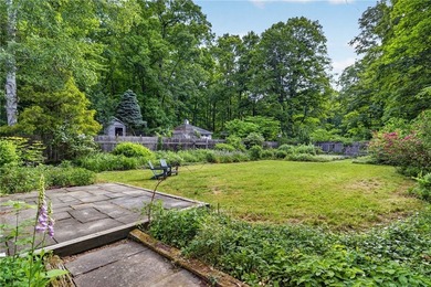 Welcome to your dream retreat, a captivating 3-bedroom - photo 39