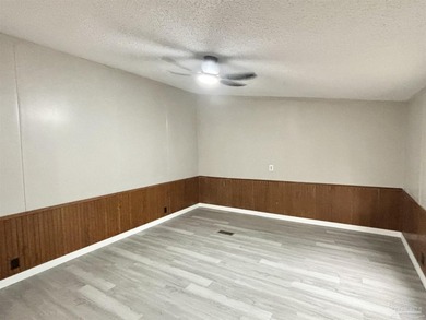 Welcome to 1816 St. Mary Drive in Gulf Breeze! This updated 4 - photo 8