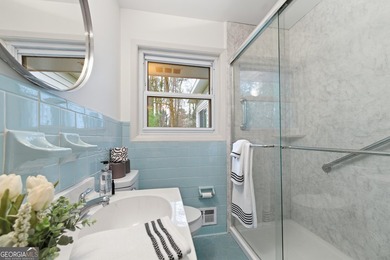 Well maintained 2 bedroom, 1.5 bath ranch featuring hardwood