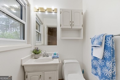 Well maintained 2 bedroom, 1.5 bath ranch featuring hardwood