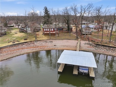Rare opportunity to own a flat, step-free lakefront lot in the - photo 1
