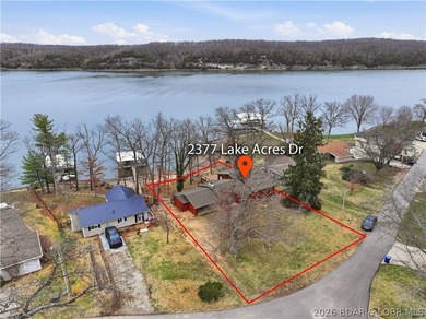 Rare opportunity to own a flat, step-free lakefront lot in the - photo 2
