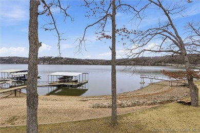 Rare opportunity to own a flat, step-free lakefront lot in the - photo 5