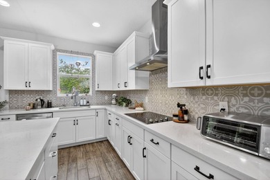 Welcome to this exceptional lakefront home, built in 2020 and - photo 29