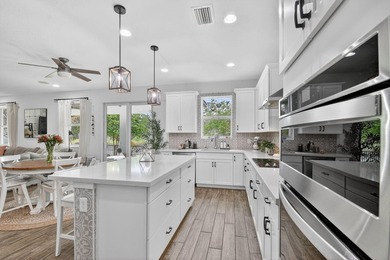 Welcome to this exceptional lakefront home, built in 2020 and - photo 30