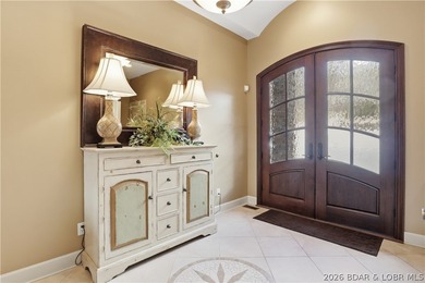 Luxury lake living in prestigious Porto Cima. This exceptional - photo 4