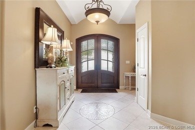 Luxury lake living in prestigious Porto Cima. This exceptional - photo 5
