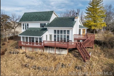 WOW! From the minute you walk in the door, the lake view is - photo 1