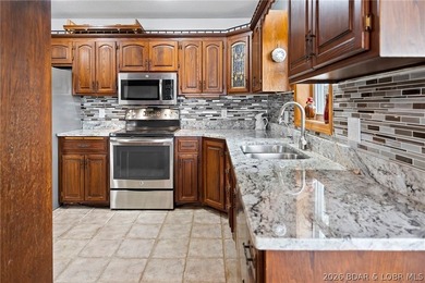 WOW! From the minute you walk in the door, the lake view is - photo 6
