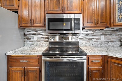 WOW! From the minute you walk in the door, the lake view is - photo 8