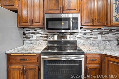 WOW! From the minute you walk in the door, the lake view is - photo 8