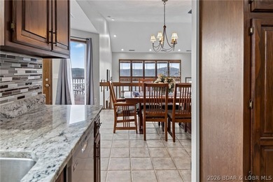 WOW! From the minute you walk in the door, the lake view is - photo 9
