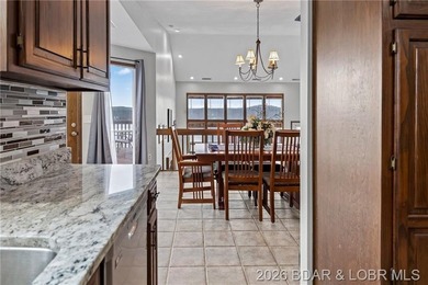 WOW! From the minute you walk in the door, the lake view is - photo 9