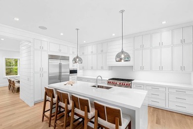 Experience luxury living in this stunning new construction by - photo 10