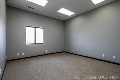 Professional office/retail building on Osage Beach Parkway with - photo 11