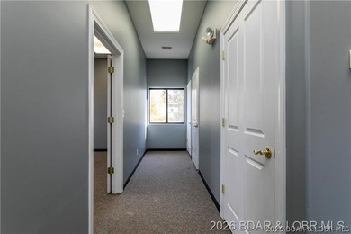 Professional office/retail building on Osage Beach Parkway with - photo 12