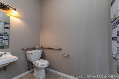 Professional office/retail building on Osage Beach Parkway with - photo 13