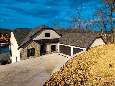 Stunning brand-new lakefront home offering the ultimate in - photo 2
