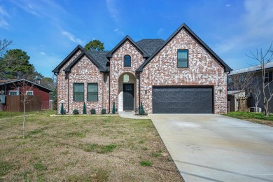 Welcome to this stunning 3-bedroom, 2-bathroom home with - Lake Home For Sale in Gun Barrel City, Texas