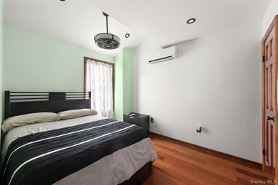 This well maintained multi-level home features hardwood floors - photo 12