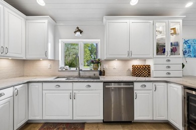 Nestled on a private one-acre homesite overlooking the tranquil - photo 13