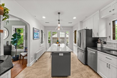 Welcome home to this beautifully updated Tudor in the heart of - photo 13
