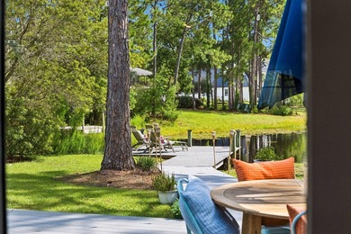 Nestled on a private one-acre homesite overlooking the tranquil - photo 16