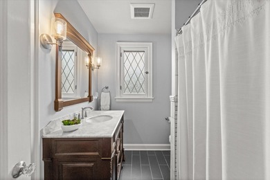 Welcome home to this beautifully updated Tudor in the heart of - photo 25