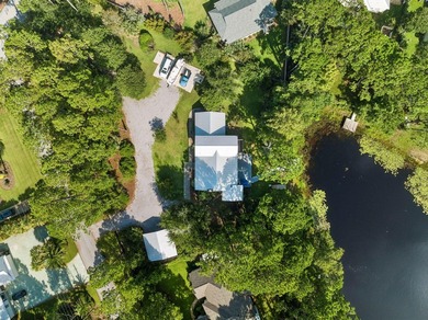 Nestled on a private one-acre homesite overlooking the tranquil - photo 33