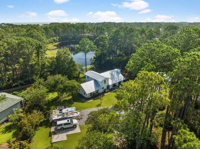 Nestled on a private one-acre homesite overlooking the tranquil - photo 34